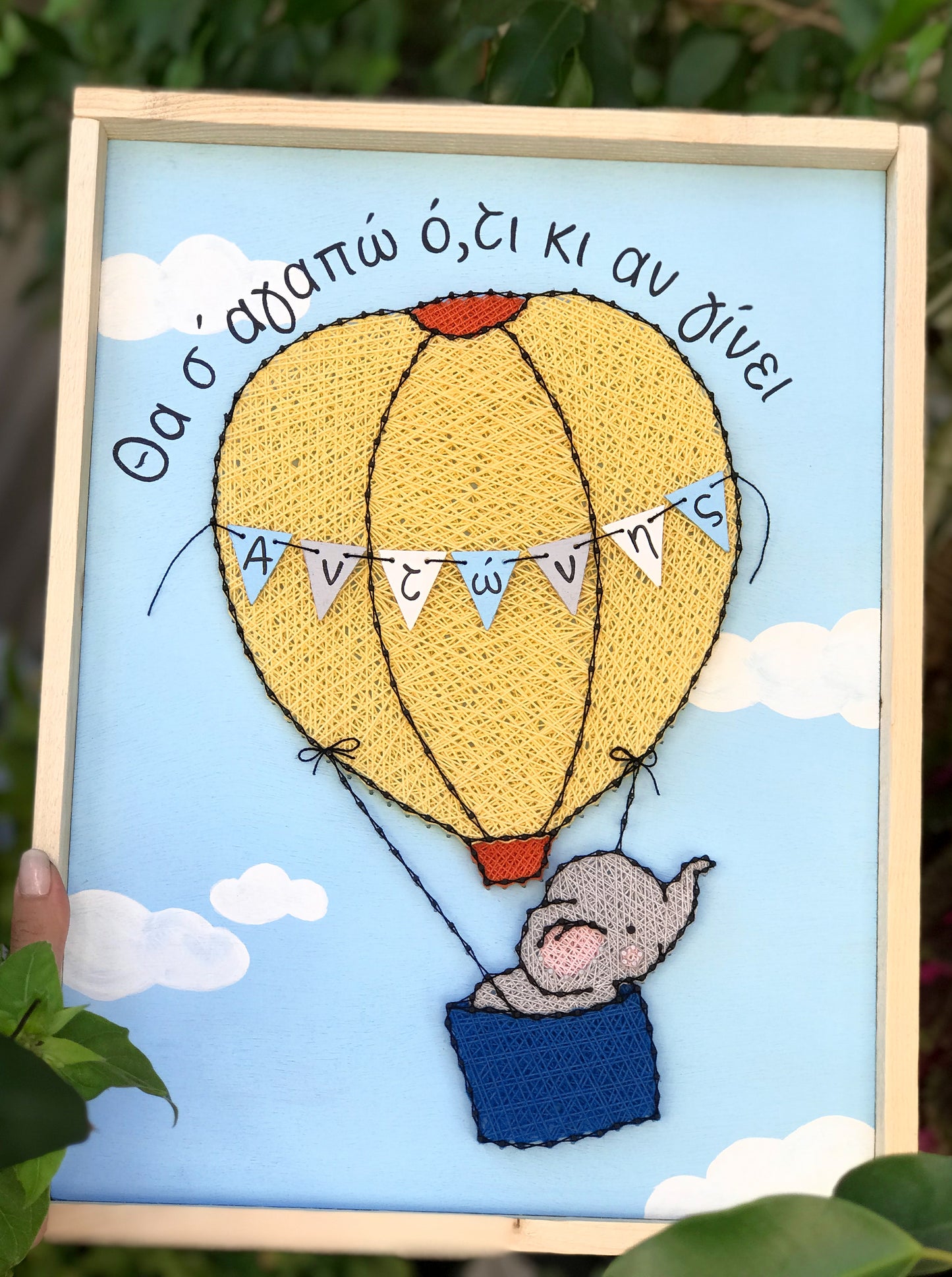 Baby elephant on a hot-air balloon