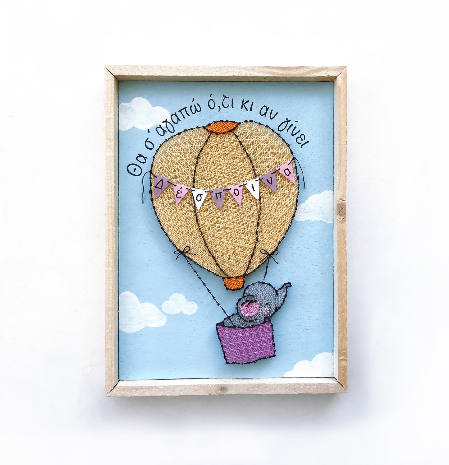 Baby elephant on a hot-air balloon