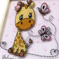 Baby giraffe with butterflies